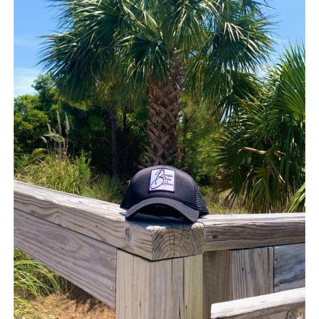a hat on a wooden fence
