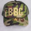 a camouflage hat with a star on it