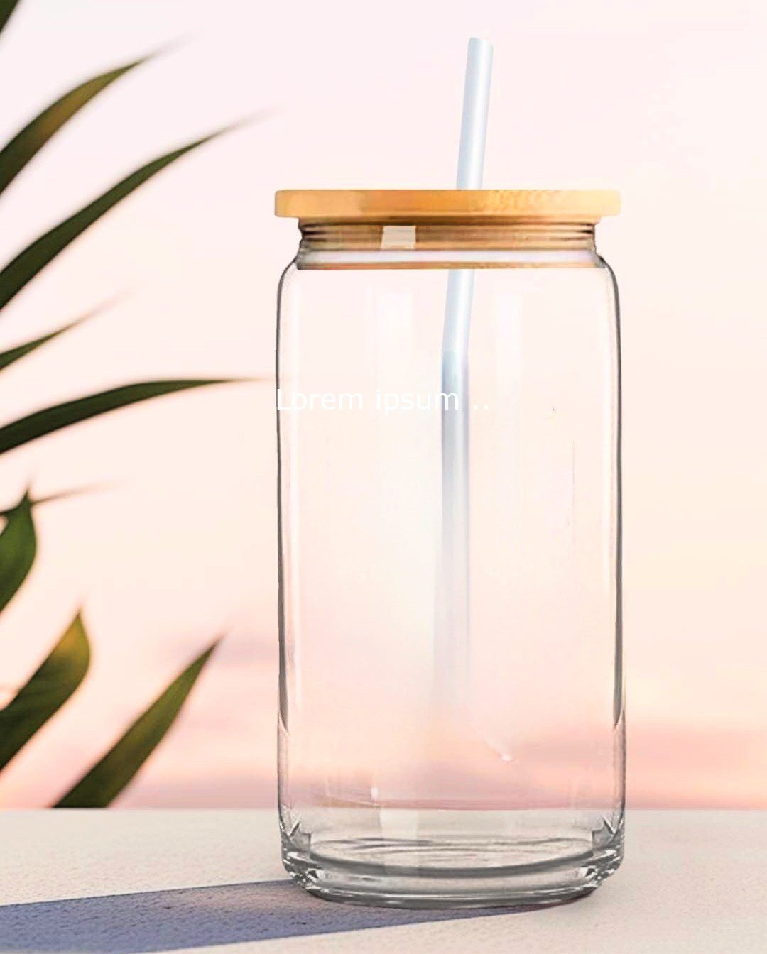 a glass jar with a straw