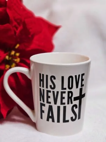 His Love Never Fails Coffee Cup